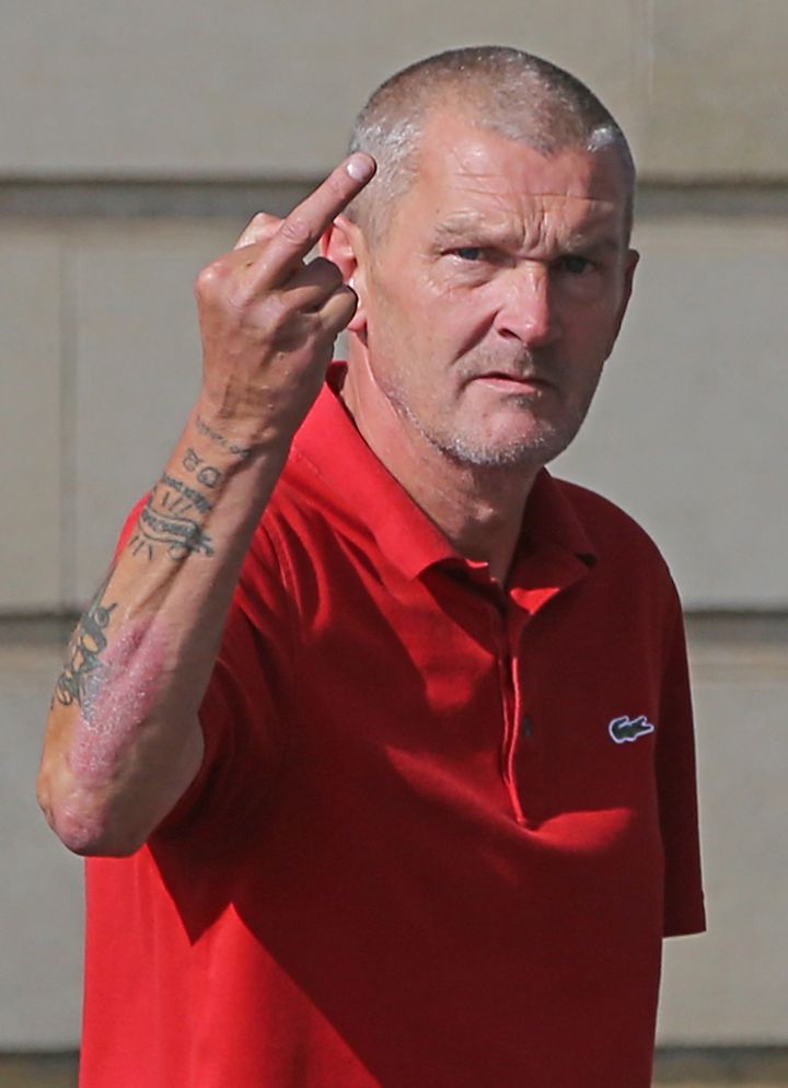 Peter Scotter gestures to the media as he arrives at Newcastle Crown Court 