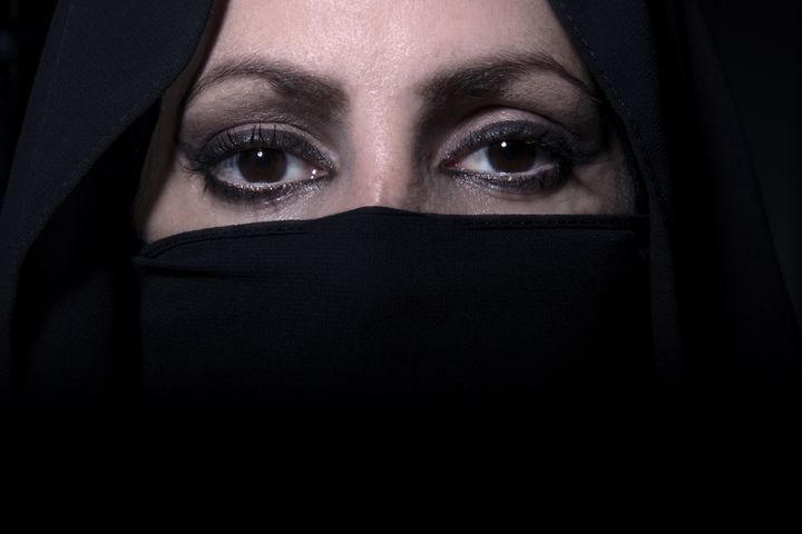The woman's niqab came away from her face, exposing her and causing pain to her neck (file picture)