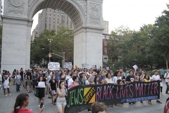 Jewish marchers gather in solidarity with Black Lives Matter at Washington Square in Greenwich Village, N.Y. 