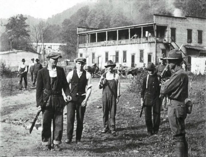 Blair Mountain strikers give up their guns after battle