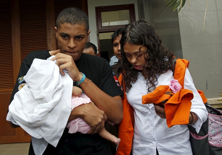 Tommy Schaefer and Heather Mack leave prison with their baby, Stella, for a court appearance in 2015 shortly before they were found guilty in the murder of Mack's mother.