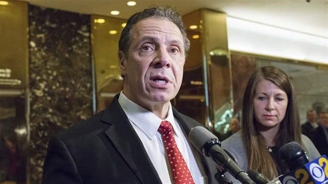 Democratic Gov. Andrew Cuomo of New York talks to reporters in January after telling then-President-elect Donald Trump that scrapping the federal tax deduction for state and local taxes would hurt taxpayers in his state.