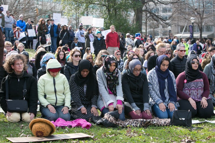 People of all faiths and religions join in a Muslim prayer during an Interfaith Rally for Muslims and Refugees at the Lutheran Church of the Redeemer on February 4, 2017 in Atlanta, Georgia.