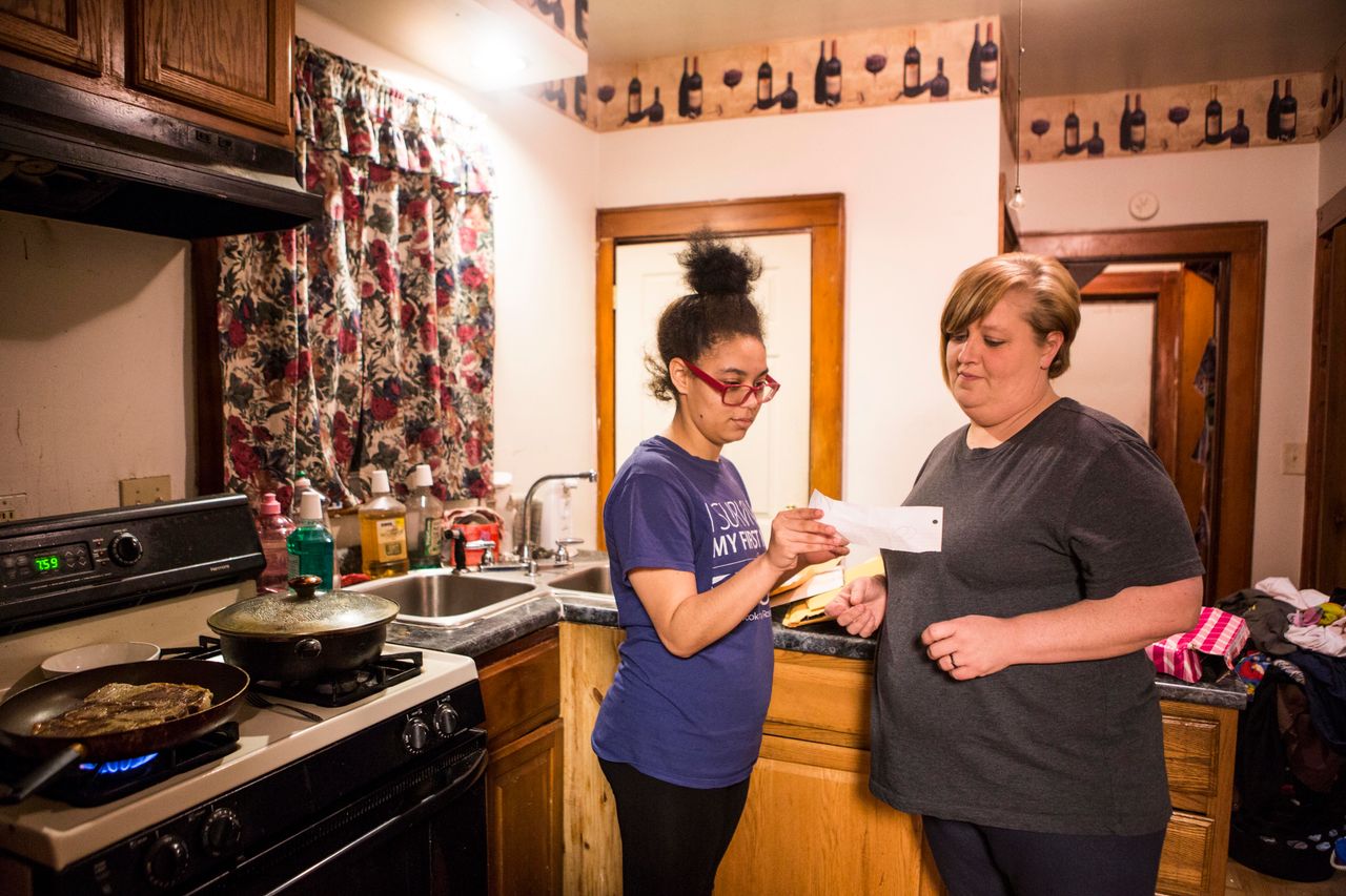 In their kitchen on Jan. 19, 2017, Brianna and Brandi look at mail from Bresha's supporters across the globe.