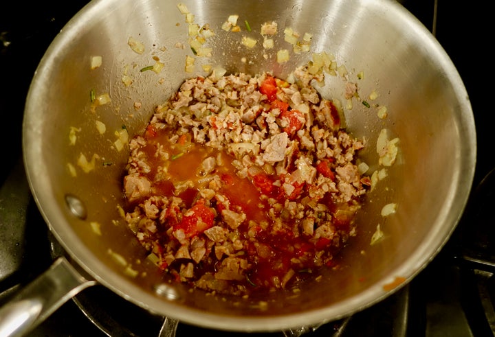 <p>Vegetable stock, then tomato sauce</p>