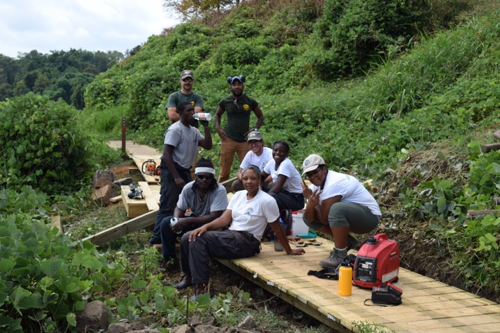 Students installing new boardwalk.