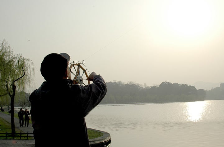 Kite-flying on West Lake, Hangzhou, China