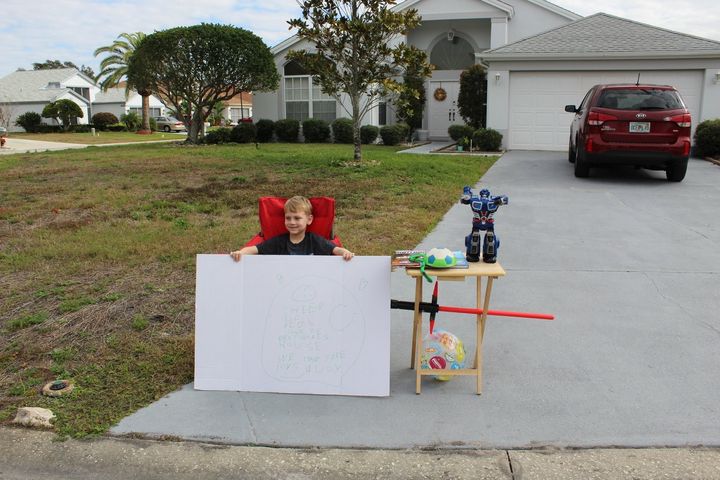 Blake Work set up a special “lemonade stand” to give away free toys to families in need.