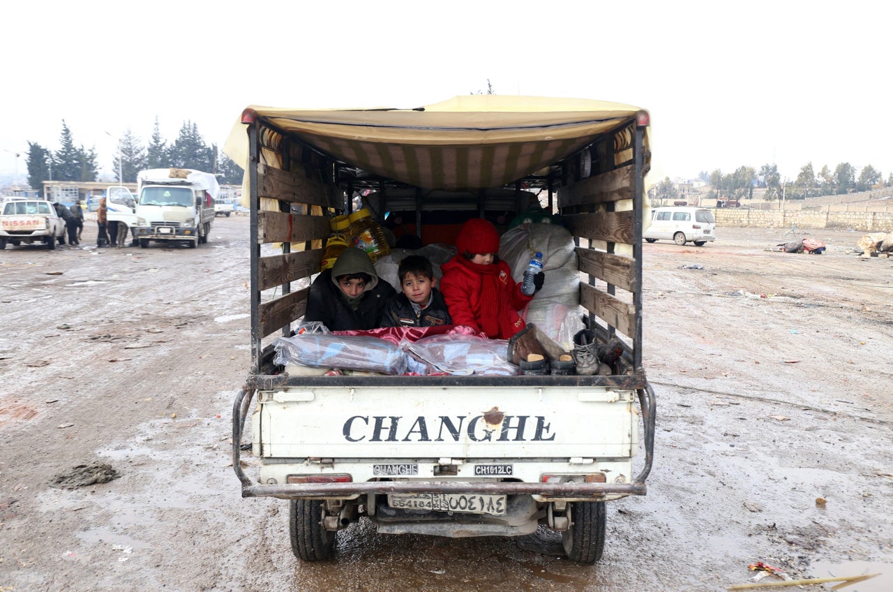 Syrians, who left the last rebel-held pockets of Syria's northen city of Aleppo, arrive on Dec. 22, 2016 in the opposition-controlled Khan al-Assal region, west of the embattled city.