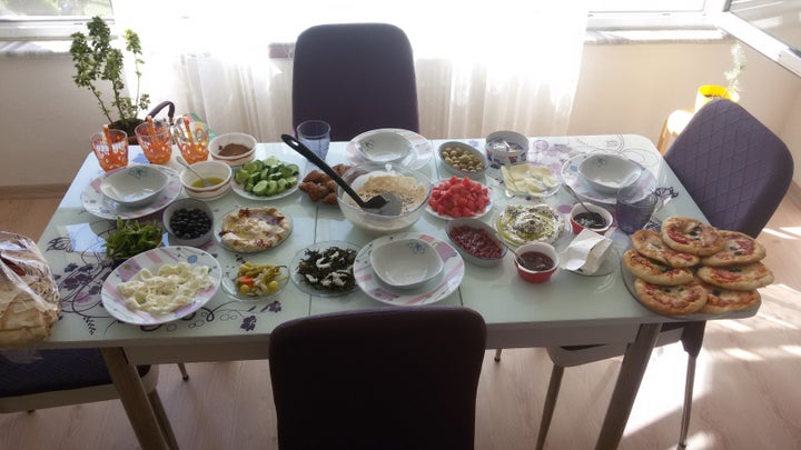 A spread of plates that make up a traditional Syrian breakfast.