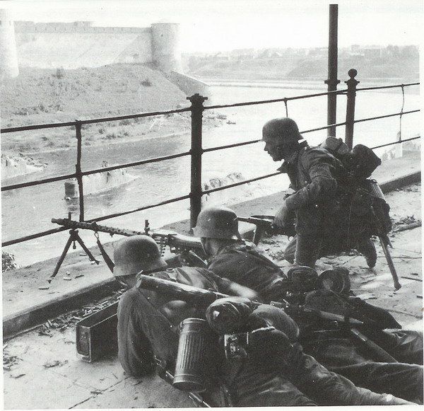 Soldiers defend the western side of the Narva River during the Battle of Narva in 1944.