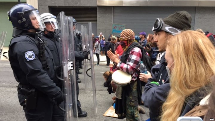 Police face off with protesters as Donald Trump is sworn-in as the 45th President of the United States in Washington, D.C.,