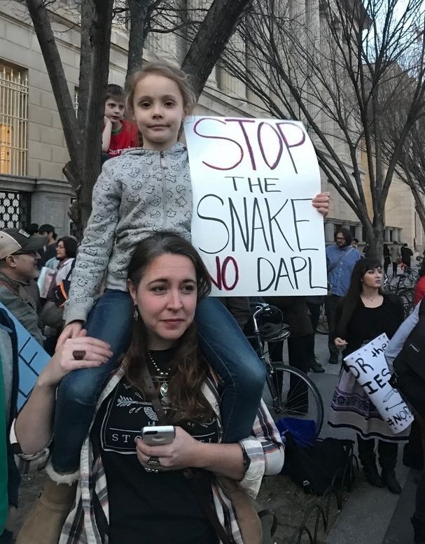 Aimee Hickman, of Baltimore, and her daughter Sylvia pictured at Wednesday's rally at the White House.