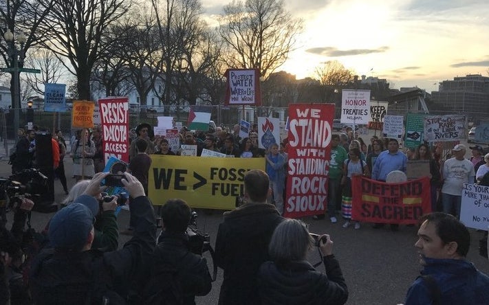 Demonstrators opposed to the Dakota Access Pipeline gathered outside the White House on Wednesday evening.