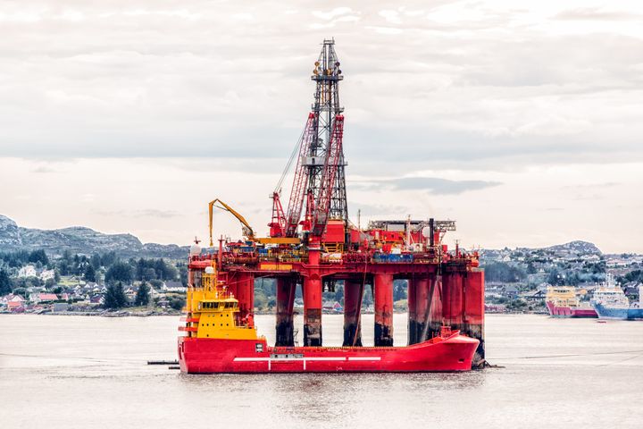 Oil platform on sea is offshore structure with facilities to drill wells, extract and process oil and natural gas and temporarily store produced goods until it can be brought to the shore for refining. In most cases the platfrom contains facilities to house the workforce. Getty