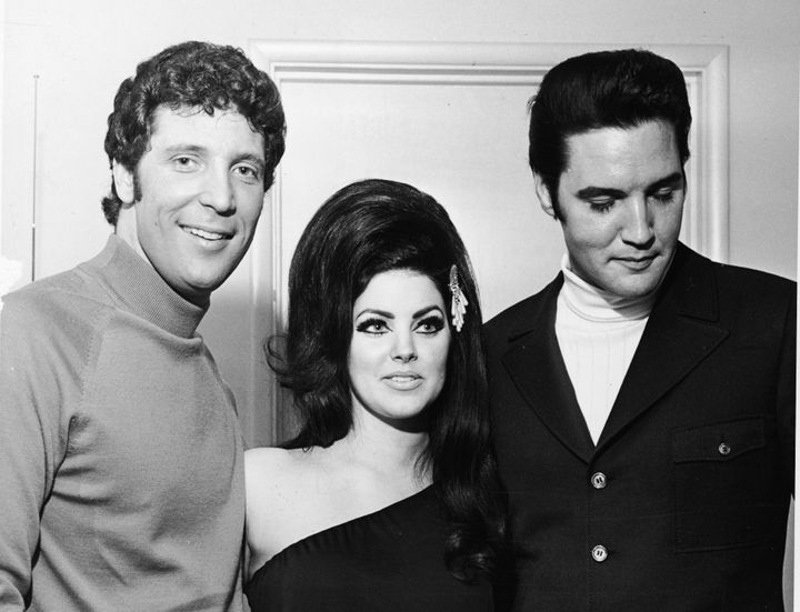 Tom Jones poses with Elvis Presley and his wife Priscilla in 1971.
