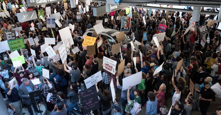 Protesters at the Los Angeles International Airport rally against Trumps executive order to ban entry into the US to travelers from seven Muslim countries.