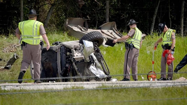 Florida Highway Patrol troopers investigate the scene of a deadly crash involving several vehicles in Lakeland, Florida, in June. Some states are using software to predict where serious crashes are likely to occur.