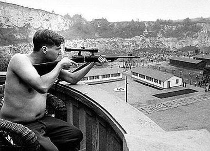 Ralph Fiennes plays Amon Goeth shooting concentration camp prisoners from the balcony of his villa in a scene from 1993's Schindler's List 