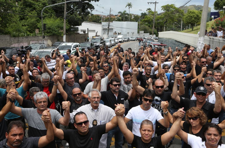 Members of the civil police in Vitoria vote in favor of a strike after one of their members was killed in a shootout. 