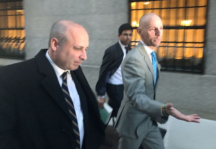 David Polos (L), a former assistant special agent-in-charge at the U.S. Drug Enforcement Administration, exits the federal court with his lawyer, Marc Mukasey (R), in Manhattan, New York, U.S., February 8, 2017.