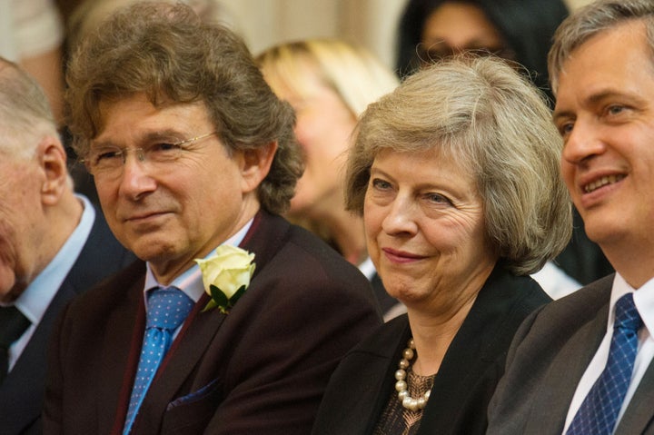 <strong>Theresa May with Nick Winton at his father's memorial service in London</strong>