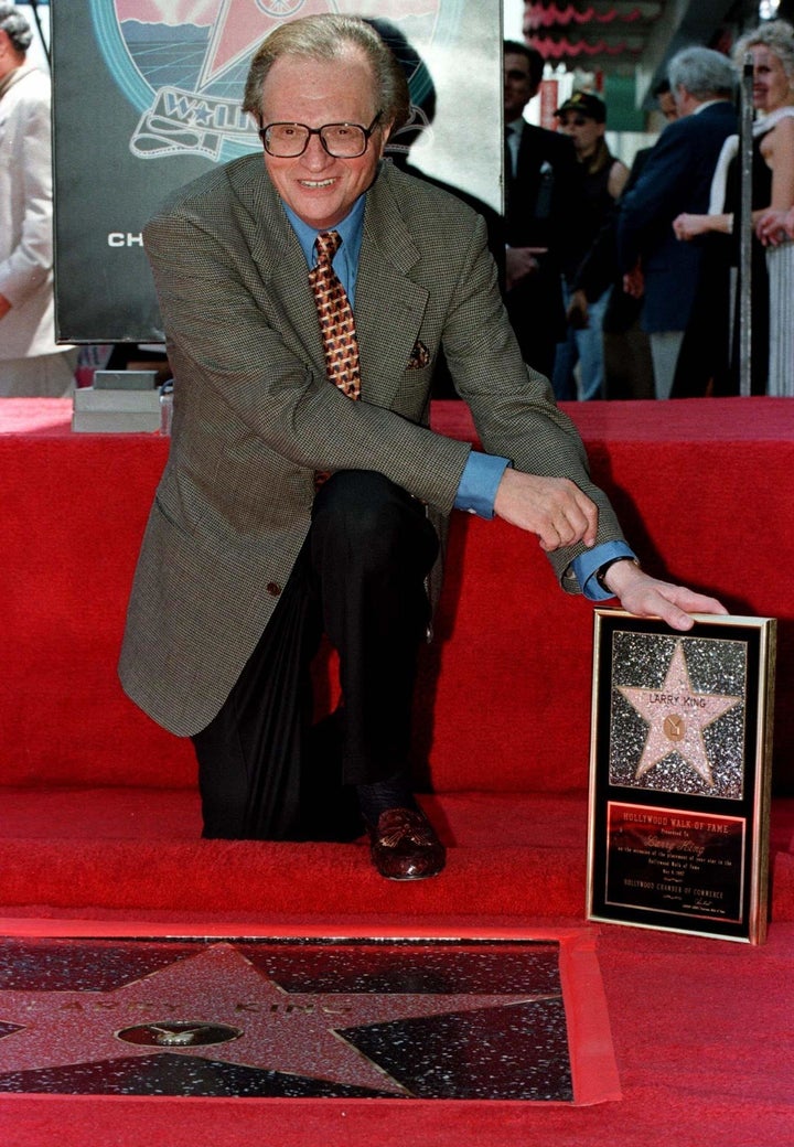 King with his plaque after his star on the Hollywood Walk of Fame was unveiled May 8, 1997.