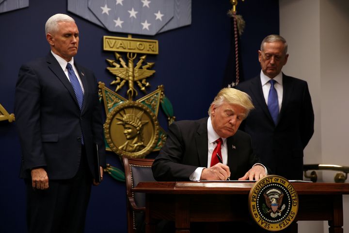 Donald Trump signs his executive order temporarily banning refugees from all over and travelers from seven predominantly Muslim countries.