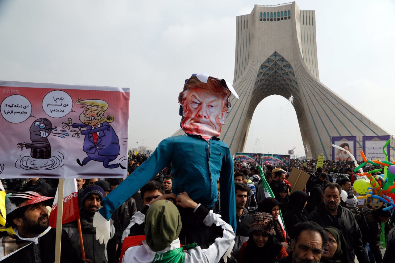 Iranians hold a dummy representing U.S. President Donald Trump during a rally marking the anniversary of the 1979 Islamic Revolution on Feb. 10, 2017 in Tehran.