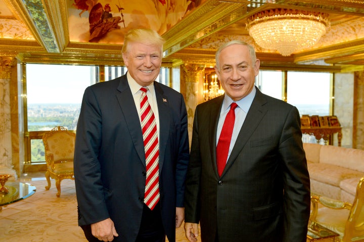 Israeli Prime Minister Benjamin Netanyahu (R) stands next to then-candidate Donald Trump during their meeting in New York, Sept. 25, 2016.