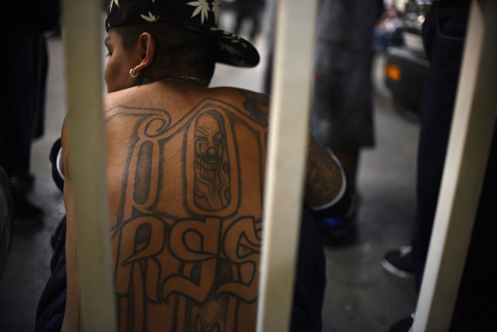 A member of the Mara 18 gang in the Supreme Court building in Guatemala City on Sept. 30, 2015.