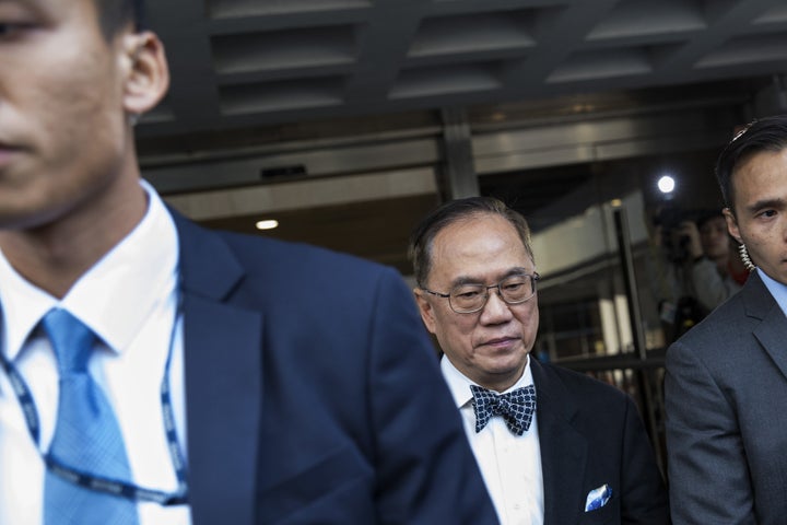 Donald Tsang, Hong Kong's former chief executive, leaves the High Court, Jan. 3, 2017. He pleaded not guilty to a bribery charge.