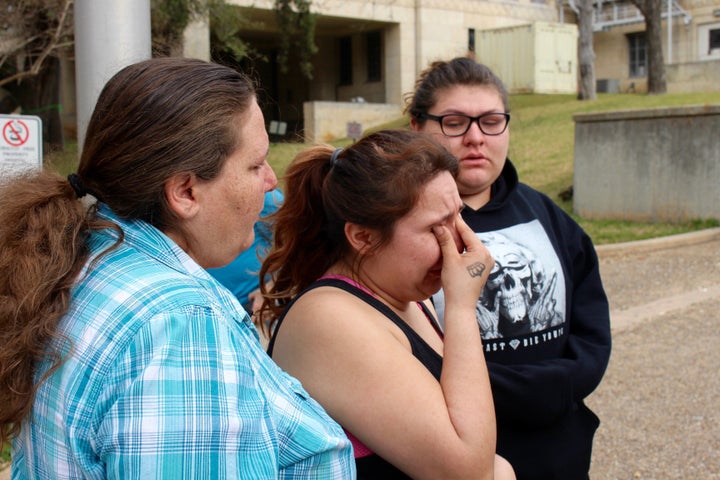 Angel Velazquez wipes tears from her eyes after exiting the courthouse in downtown Austin, Texas. Her boyfriend, Hugo, was detained by Immigration and Customs Enforcement on Feb. 10, 2017, and now faces deportation.