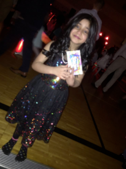 Noor shows off her prize … and matching socks.