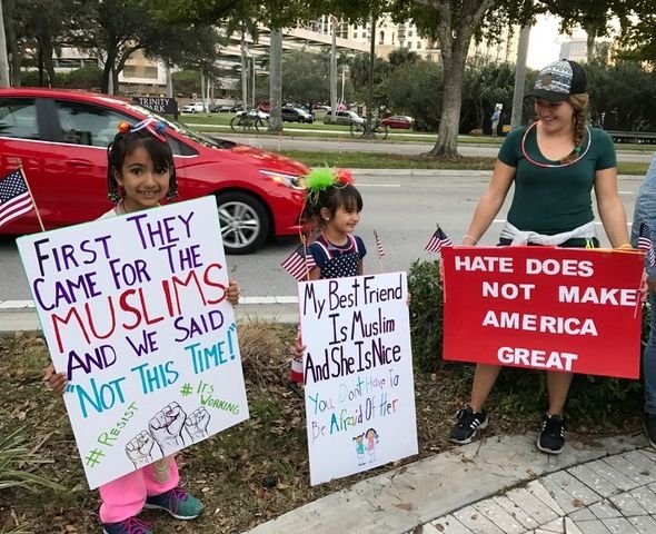 Mom helped with the signs but she didn’t do it all—note the cool drawing of the two little girls holding hands. Plus these kids were proud of what they had to say and delighted with the love they felt! 