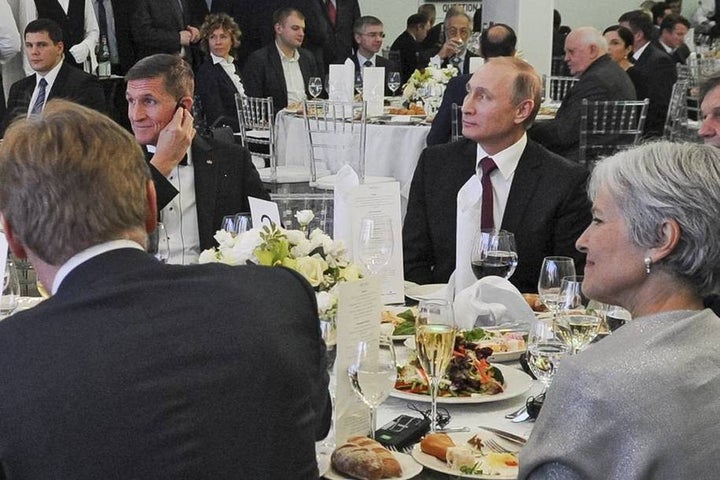 Trump’s national security adviser, Michael Flynn, at an RT party with Russian president Vladimir Putin.