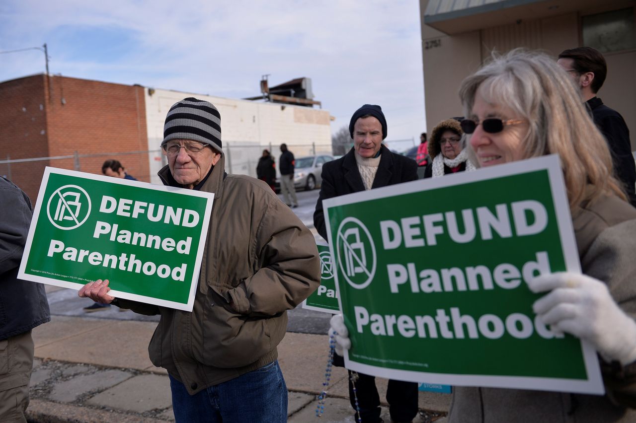 Anti-abortion activists protest in front of Planned Parenthood, Far Northeast Surgical Center in Philadelphia, Pennsylvania, U.S., February 11, 2017.