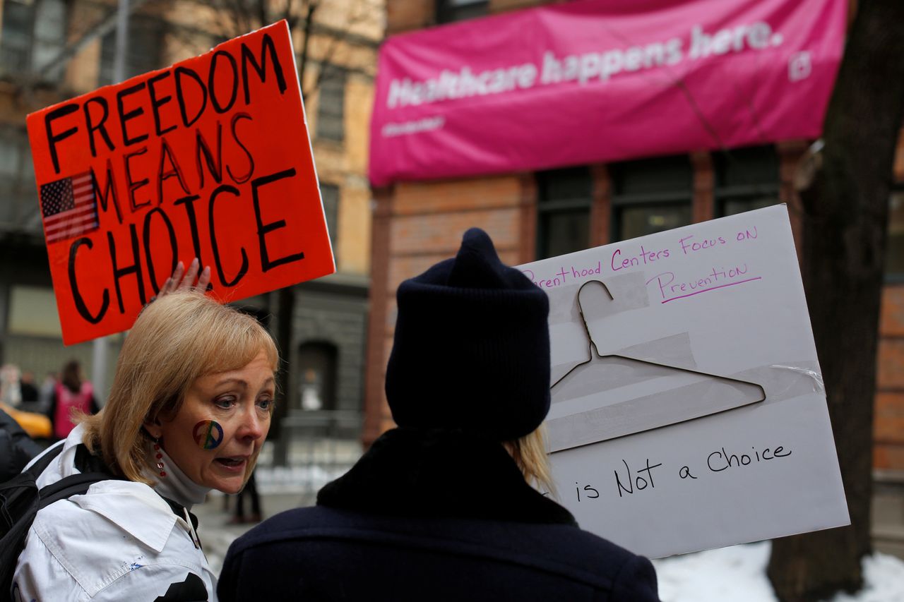 Rebecca Bigsby of New Jersey participates in a pro-choice counter protest during an anti-Planned Parenthood vigil outside the Planned Parenthood - Margaret Sanger Health Center in Manhattan, New York, U.S., February 11, 2017.