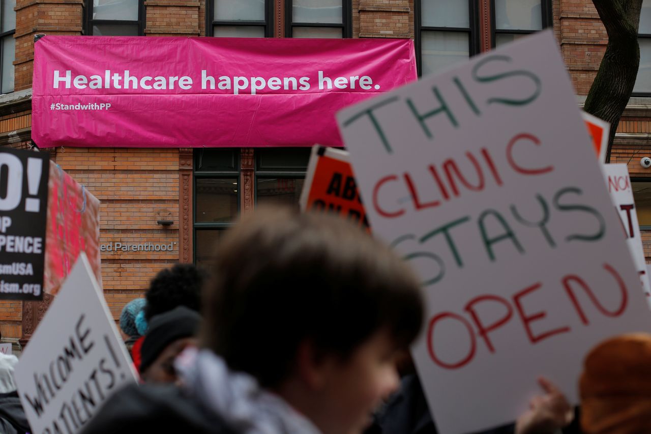 Pro-choice protesters gather to counter an anti-Planned Parenthood vigil outside the Planned Parenthood - Margaret Sanger Health Center in Manhattan, New York, U.S., February 11, 2017.