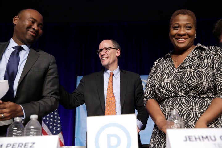 Former Secretary of Labor Tom Perez (center) speaks to Jaime Harrison (L) and Jehmu Greene during a forum in Baltimore, Maryl