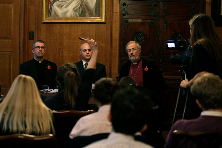 The Right Reverend Dr Peter Selby, right, Robert Gordon, center, the manager of St Paul's Institute and Reverend Canon Michael Hampel during a media question and answer session in 2011.