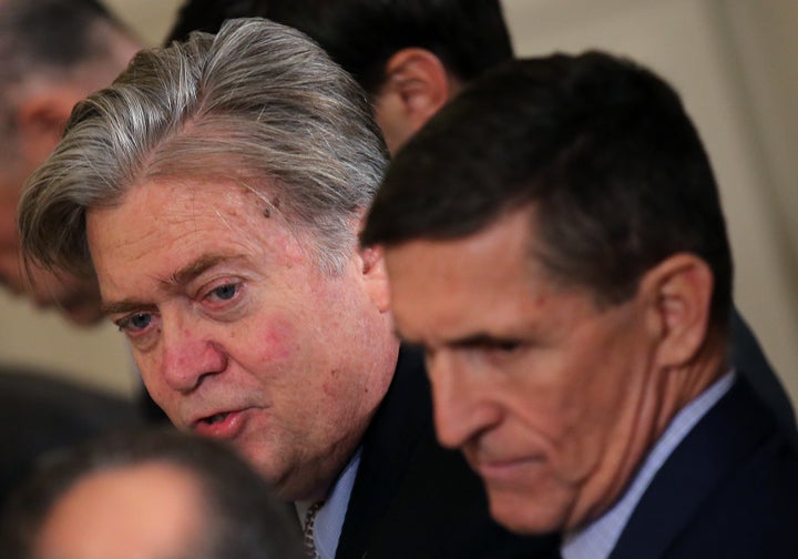 Chief White House strategist Steve Bannon, left, sits with White House National Security Adviser Michael Flynn before a news conference at the White House on Jan. 27.