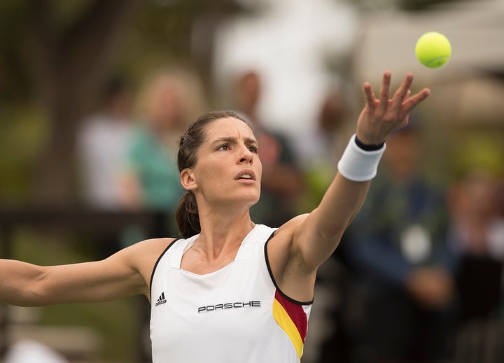 German tennis player Andrea Petkovic, seen during Saturday's match, later said that she considered walking off the court during the singer's performance. 