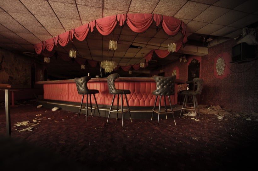 Empty bar at an abandoned honeymoon resort; courtesy of Seph Lawless 2017 <a rel="nofollow" href="http://sephlawless.com" tar