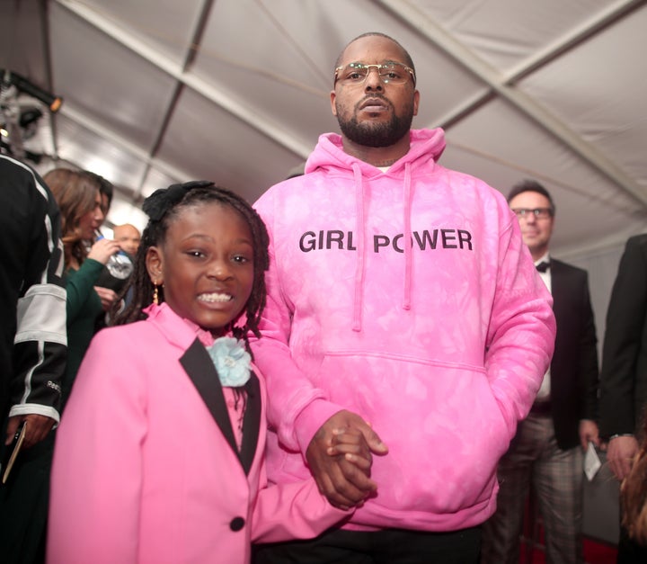 Rapper Schoolboy Q and daughter Joy Hanley at the 59th Grammy Awards.