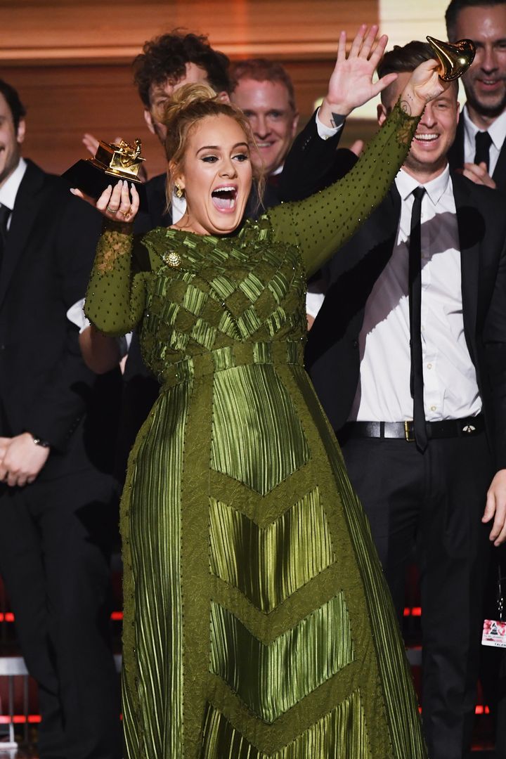 Adele purposefully breaks her Grammy so she and Beyoncé can share it