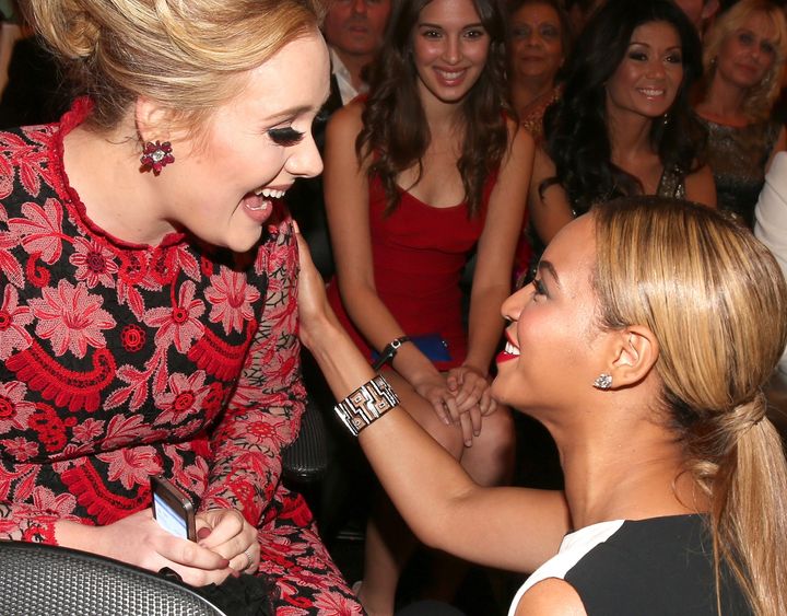 Adele and Beyonce at the Grammys in 2013. 