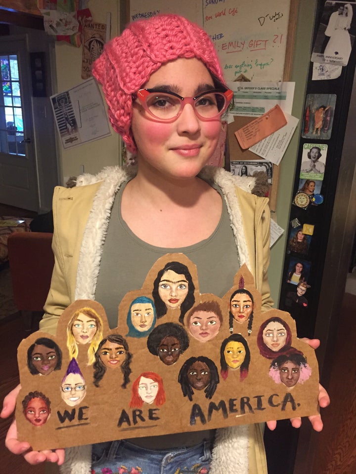 My oldest on her way to DC with the poster she painted.