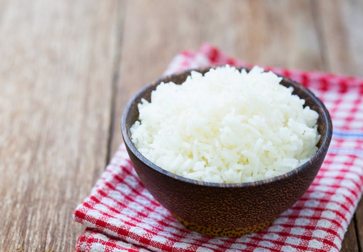 A bowl of cooked white rice.