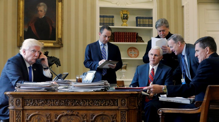 Trump and some of his men: Chief of staff Reince Priebus, Vice President Mike Pence, senior advisor Steve Bannon, Communications Director Sean Spicer and National Security Advisor Michael Flynn.